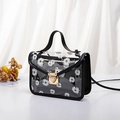 Transparent PVC handbag with white daisy print and black leather trim details - Black