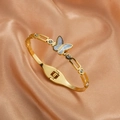 Bracciale rigido farfalla oro 18K con inserti in conchiglia e zirconi su seta - Oro