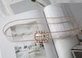 Detail of transparent belt with gold chain trim and pearl-encrusted metal buckle - Rectangle Pearl Transparent (Gold Beaded Edge)