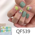 Detail view of mint green matte nail stickers with frog and cloud patterns, model QF539 - QF539