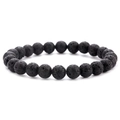 Detailed view of natural black lava stone beads with porous texture for elastic bracelet - Lava Stone