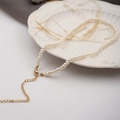Miniature freshwater pearl necklace featuring a gold adjustable lobster clasp finish - Flat Bead