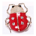 Red enamel ladybug brooch with gold finish and rhinestones on white surface - Style 1 (NO.1)