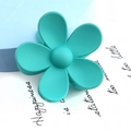 Detailed close-up of a large turquoise blue matte flower hair claw clip with five petals - Large Flower Style / Lake Blue