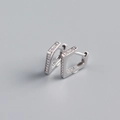 Detailed view of S925 sterling silver triangle hoop earrings with sparkling zircon stones - 925 Silver / White Gold