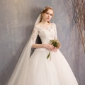 Elegant white lace wedding dress with sheer mid-sleeves and a voluminous tulle skirt - US 26W / White Floor Length