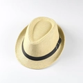 Detailed macro view of woven straw texture with black ribbon and silver metal buckle - 54cm / Beige