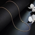 Elegant 18k gold-plated stainless steel O-chain necklace displayed with white dried flowers - Gold O-Chain