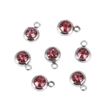 Macro detail of seven pink birthstone pendants with silver stainless steel settings - Bright Pink Silver Base