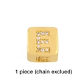 Close-up of a gold-plated dice charm with rhinestone letter E for DIY bracelets - Gold Letter E Pendant Bead