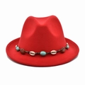 Detail of red wool felt fedora featuring bohemian shell and blue bead hatband decor - Red