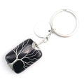 Detail of life tree wire wrapped black stone keychain with silver metal ring and tag - Obsidian