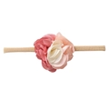 Close-up of pink and beige nylon floral headbands with soft elastic texture for infants - Gradient Colors