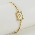 Pulsera de titanio dorado con colgante cuadrado de nácar letra R y cadena de caja fina - Letra R