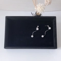 Elegant silver curved pearl earrings displayed on a black velvet jewelry organizer tray - Small Black Velvet Empty Tray - No Lid