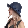 Elegant navy blue straw sun hat for women featuring a large decorative bow on a plain white background - M / Navy Blue