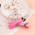 Eleganter Kristall-Kronen-Haarclip mit rosa Schleifendekoration und silbernem Metallclip - Pflaumenrot mit Kronenanhänger