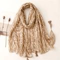 Detailed macro view of zebra pattern scarf with gold foil dots and elegant tassel trim - 180*90CM / Khaki