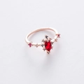 Detailed macro view of rose gold ring with marquise cut ruby and zircon accents - 1#12950A (Red) Fixed Size