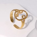 Adjustable hollow abstract face ring in gold-plated stainless steel on white stone - Adjustable / Gold