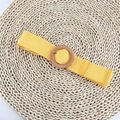 Close-up of ginger yellow elastic woven belt with dark brown round wood grain buckle - Round Buckle Yellow