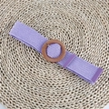 Detailed macro shot of a purple elastic woven belt with a round wood-grain buckle - Round Buckle Purple