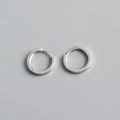 S925 sterling silver minimalist huggie hoop earrings with polished finish on gray background - Large / Silver