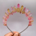 Dettaglio di cristalli sfumati rosa e arancio su una fascia dorata con luna - Arancio Rosa + Filo d'Oro Cerchietto Argentato Luna d'Oro
