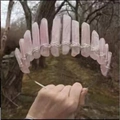 Close-up of handmade pink crystal crown with wire wrapping for weddings and festivals - Rose Quartz + Silver Wire Silver Headband