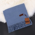 Soft blue cashmere blend scarf with elegant fringe tassels and premium leather label - Denim Blue