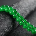 Polierte grüne Chalcedon-Rundperlen in einem glatten Strang aus Natursteinschmuck - 4mm (ca. 90 Stk.) / Malay-Jade
