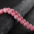 Cuentas redondas de calcedonia rosa natural con acabado pulido para hacer joyas - Rodocrosita