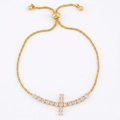 Bracciale a croce placcato oro regolabile con zirconi scintillanti su catena a scatola - Croce