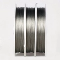 Three spools of metallic silver-gray jewelry wire for DIY bracelet making and repairs - Beading Steel Wire / 【product Parameters】the Image Shows The Product’s 【metallic Texture】and The Specifications Of 【three-piece Set/multiple Rolls】.