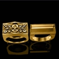 Detailed view of a gold skull ring with square face and intricate leaf carvings - US 6 / Gold Pair