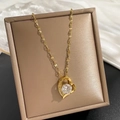 Elegante gouden hartketting met zirkoon hanger in een luxe lederen juwelendoosje - Goud (H214)