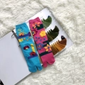 Detailed view of colorful jacquard tabi socks with floral patterns on white plush rug - 35-41 / Blue Pink Flower