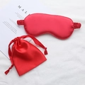 Silk-textured red sleep mask set including a matching drawstring storage pouch - Red