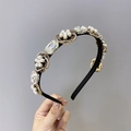 Baroque black headband featuring vintage gold alloy flowers, pearls, and crystals - White