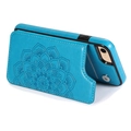 Detail of blue leather phone case featuring mandala embossing, card slots, and kickstand - iPhone 5/5s/se / Blue