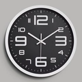 Modern 12-inch round wall clock with matte black dial and bold white Arabic numerals - White Frame Black Dial