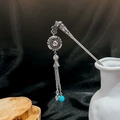 Detail of silver vintage hairpin with turquoise bead and tassel in a ceramic vase - Silver/F241/Turquoise Ancient Tassel