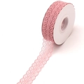 Macro detail of a roll of pink lace ribbon with delicate scallop edges for floral gift wrapping - One Roll / Pink