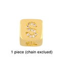 Detailed macro view of a gold-plated dice-shaped alphabet S charm with sparkling cubic zirconia - Gold Letter S Pendant Bead