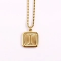 Gold stainless steel square pendant necklace featuring embossed letter I with sunburst texture - Letter I