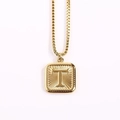 Golden square pendant necklace with engraved letter T and box chain on white background - Letter T