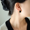 Rectangular Roman numeral stud earrings in 18K gold plated steel with black enamel inlay - Gold