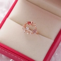 Close-up of rose gold flower ring with red crystals and butterfly detail in a gift box - 1#14115A (Rose Gold Red Gem Flower)