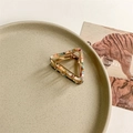 Detail of triangle acetate hair claw clip with colorful tortoise texture and gold metal frame - 4# Iridescent Splash / AB Color