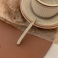 Detail of elegant gold-tone hair clip featuring two rows of white pearls on warm background - Double Row Pearl-Gold Bobby Pin